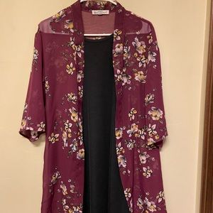 black dress with a floral cover up